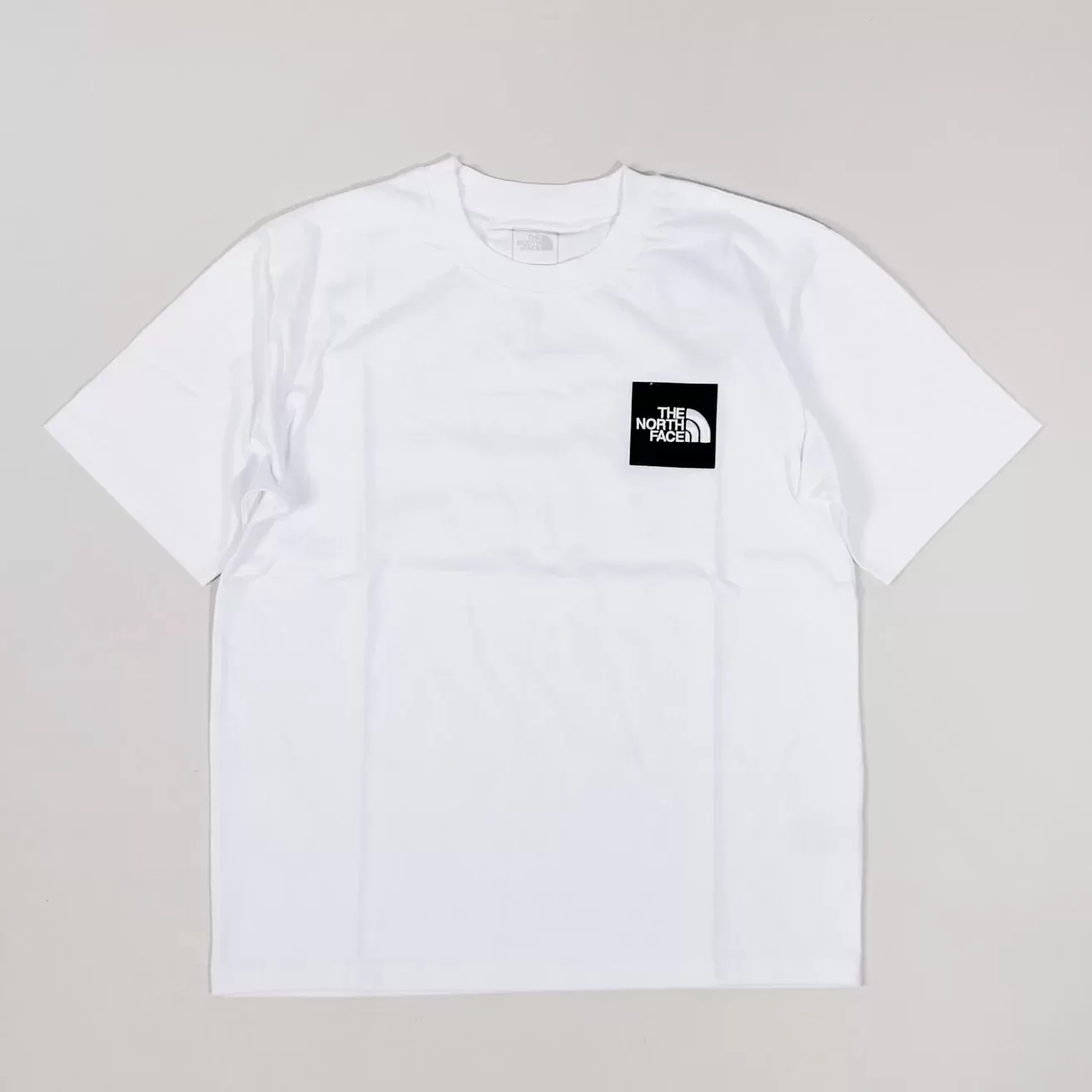 The North Face 3D Square Embroidered Woven Label Tee [NF0A7QQT]